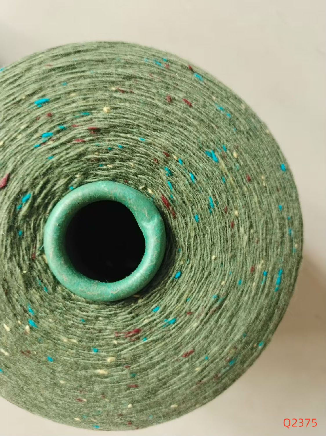 7.6支含40%羊毛軍綠色Q2375彩點(diǎn)紗